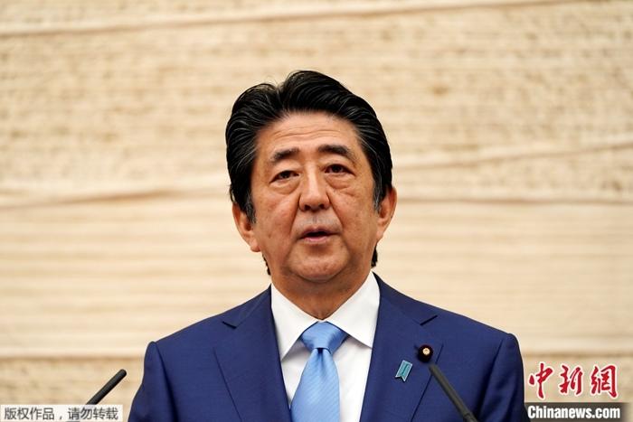 资料图为日本首相安倍晋三。